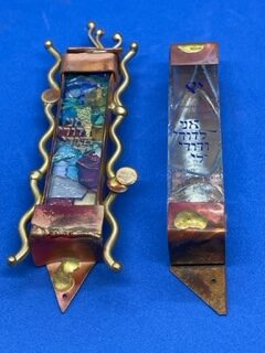 Wedding Mezuzot (Ani Li Dodi): Left-This classic wedding Mezuzah has a place for the broken wedding glass shards. The English and Hebrew reads: I am my beloved’s and my beloved is mine. RC20 $100
Right-Ani Li Dodi-Two pieces: Glass tube with Scroll is removable. RC18 $80