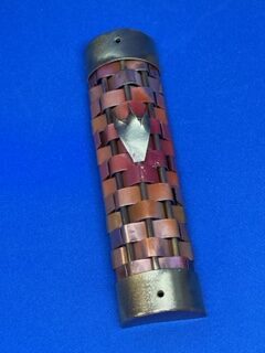 Woven copper 4 inch Mezuzah created by one of two autistic craftsmen in the studio. RC4 $70